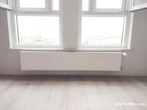 武汉滨江金茂府精装房采暖明装暖气片暗埋舒适供暖